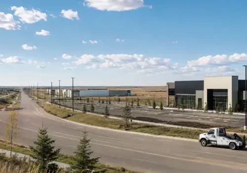 Tow truck providing vehicle towing service in Balzac, Alberta