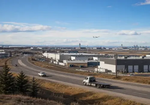 Tow truck providing vehicle assistance in Northeast Calgary